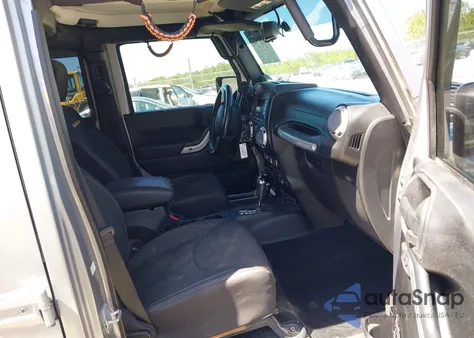 2014 Jeep Wrangler Unlimited Sahara from USA, damaged, VIN 1C4HJWEG5EL143315